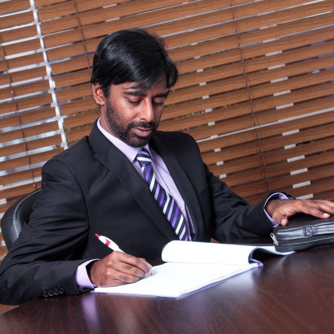 Jai'prakash - suited up in the office